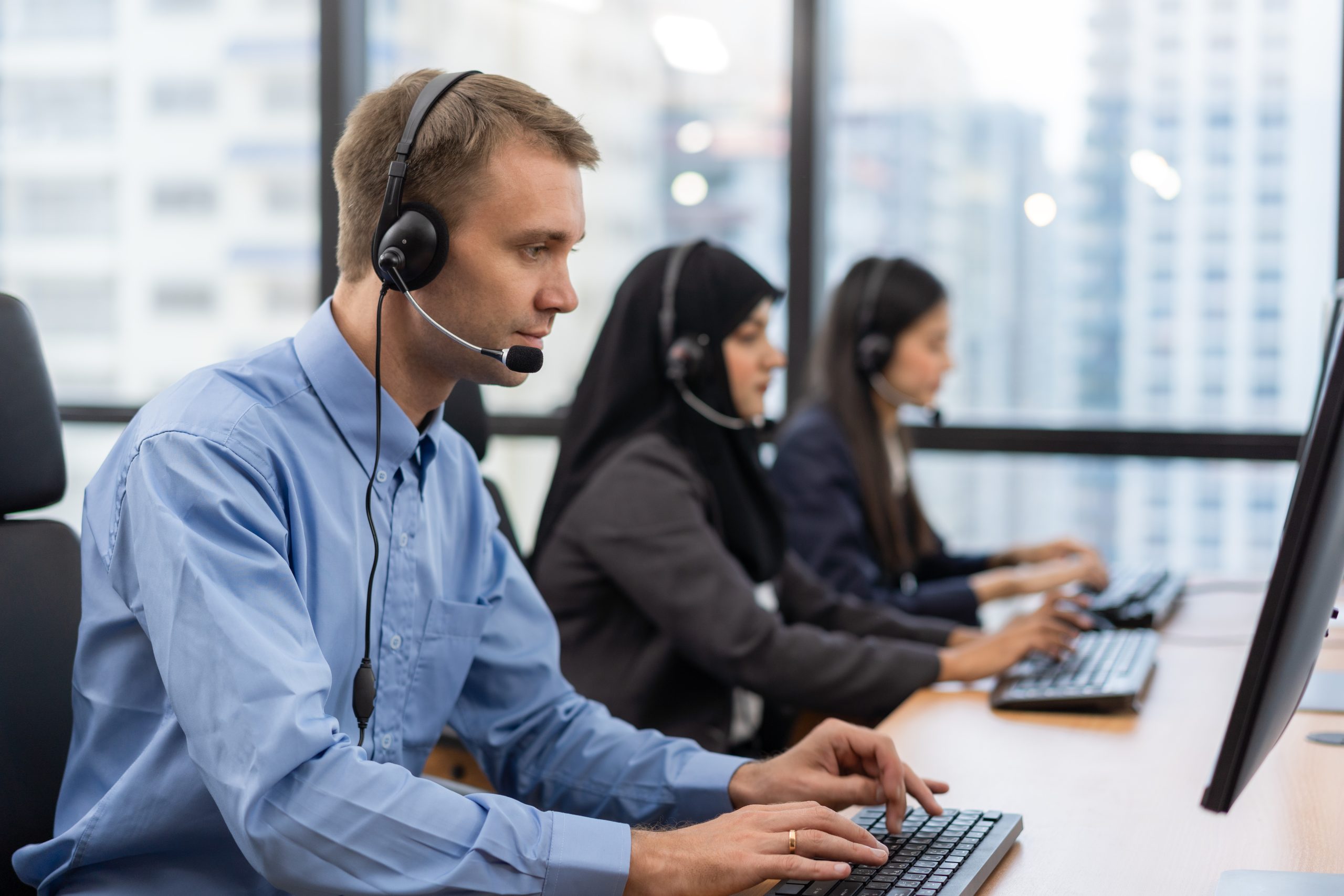 Happy smiling operator customer service agent with headsets work